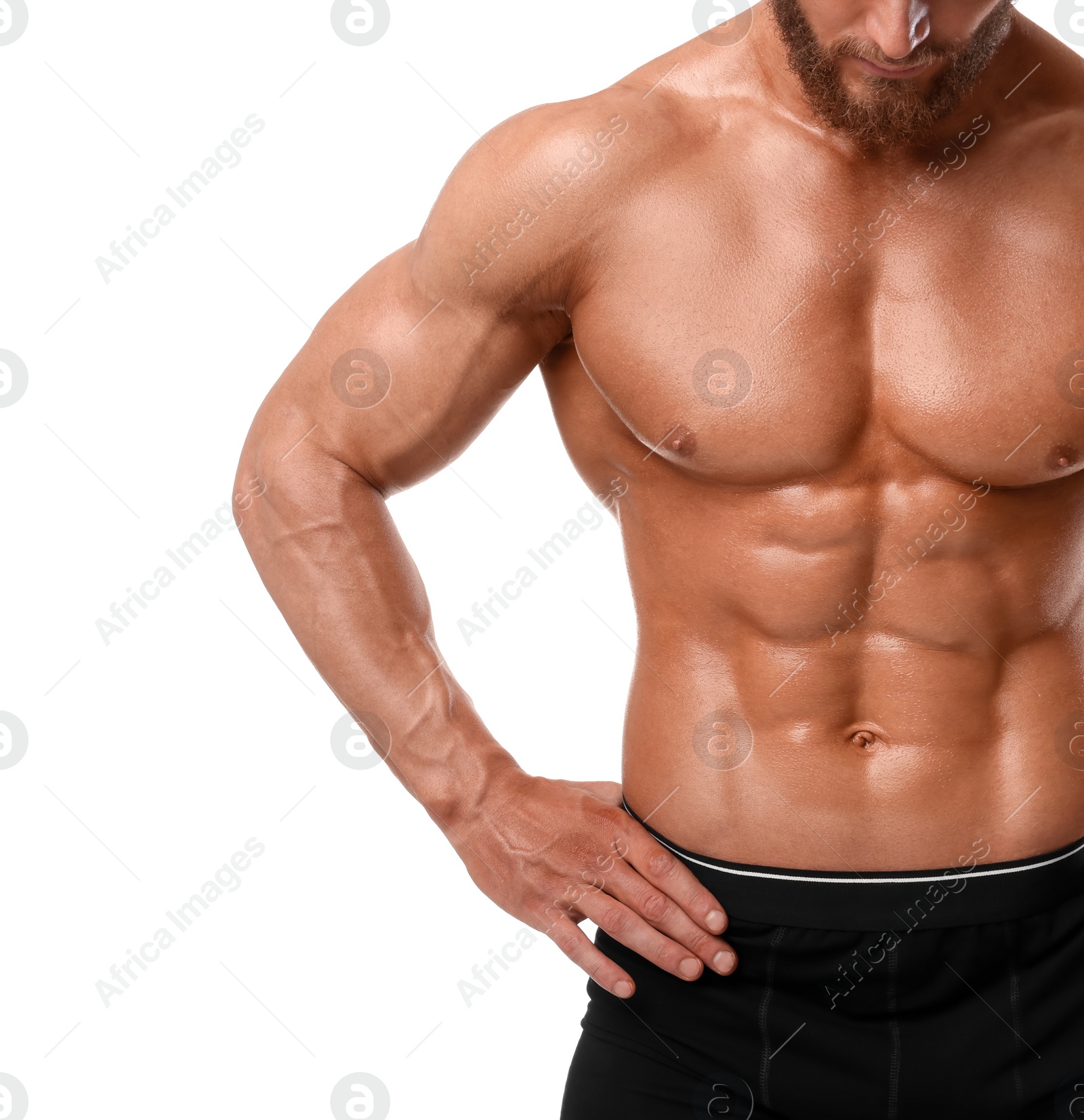 Photo of Young bodybuilder with muscular body on white background, closeup