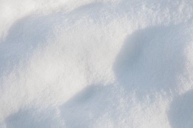 White snow as background, top view. Winter season