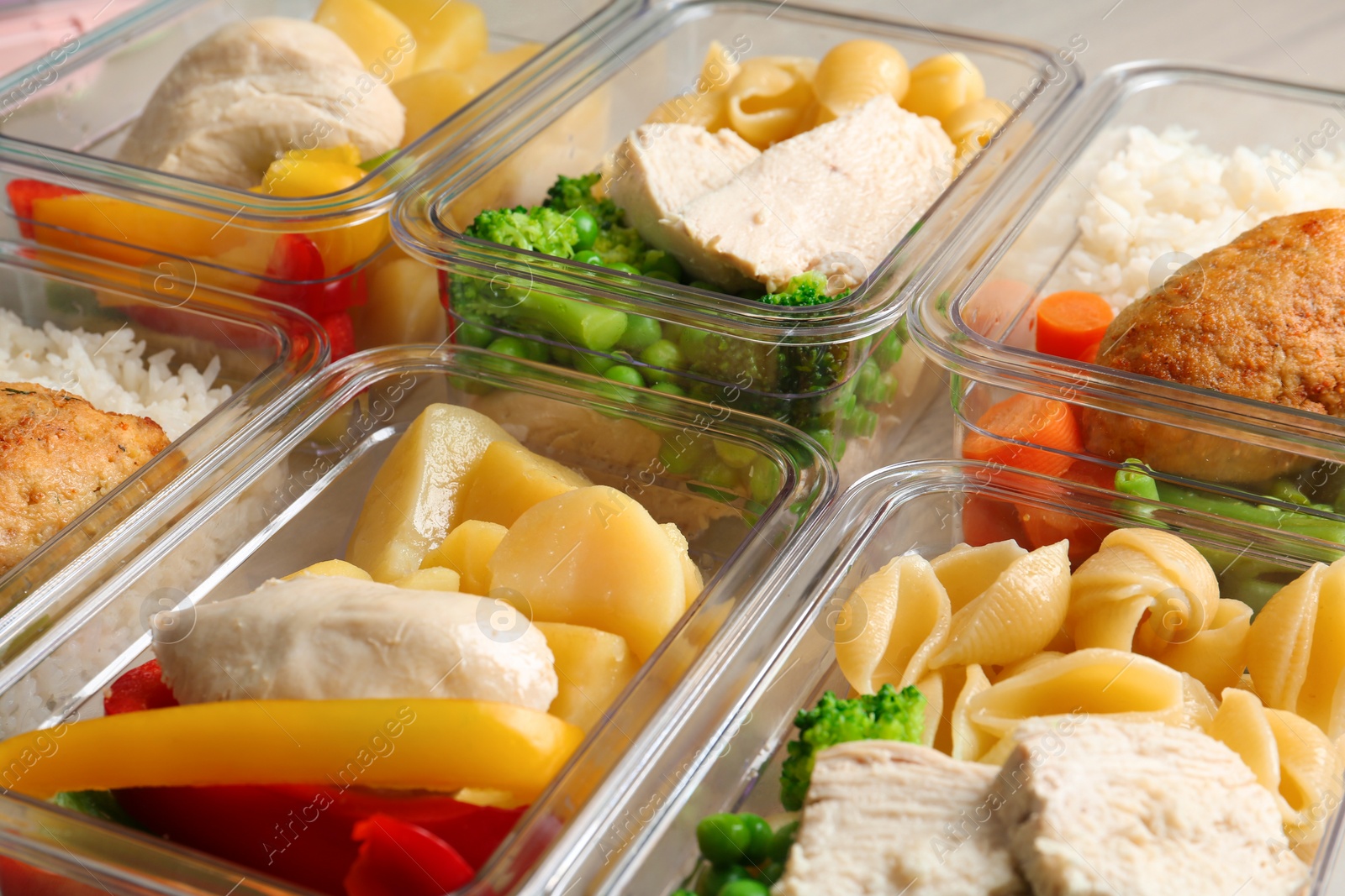 Photo of Boxes with prepared meals as background, closeup