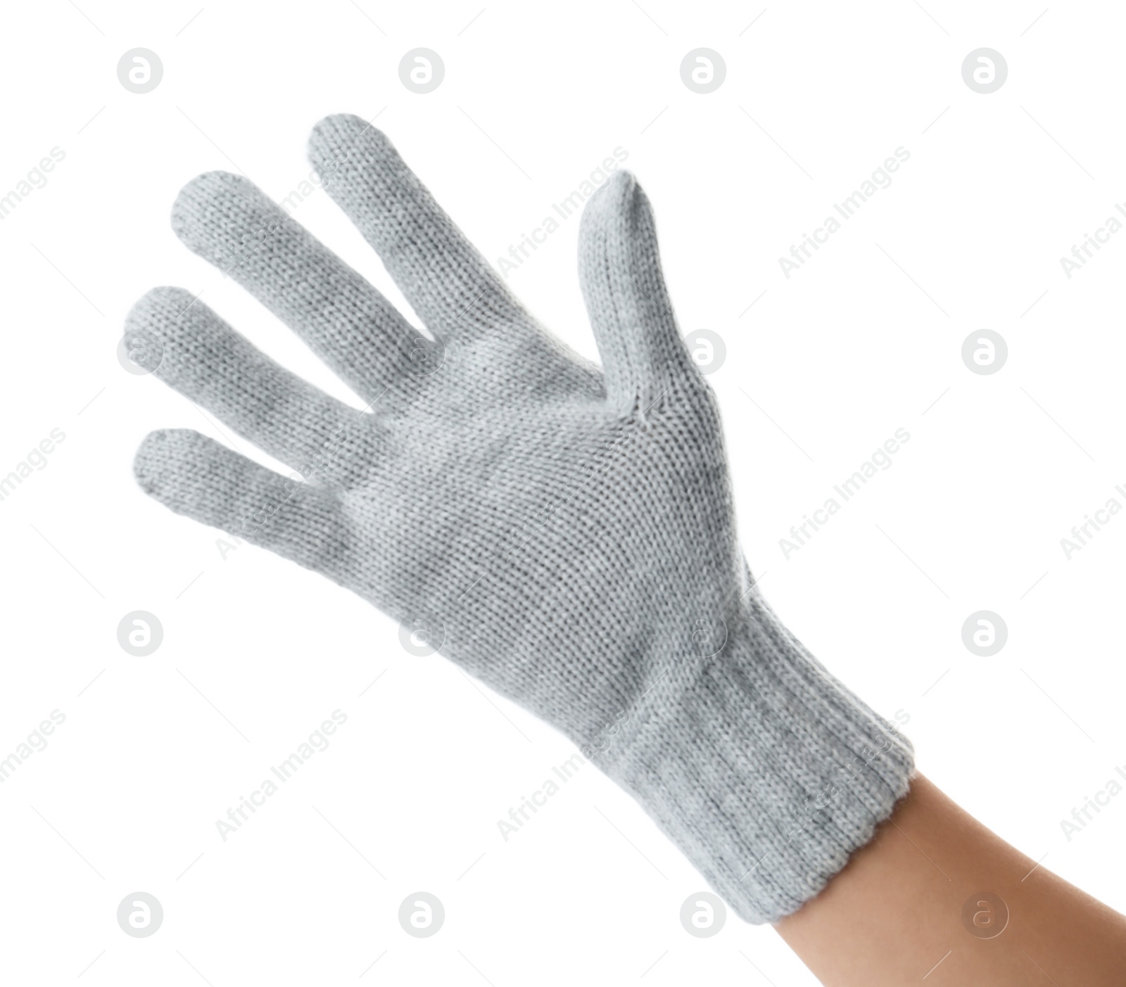 Photo of Woman wearing grey woolen glove on white background, closeup
