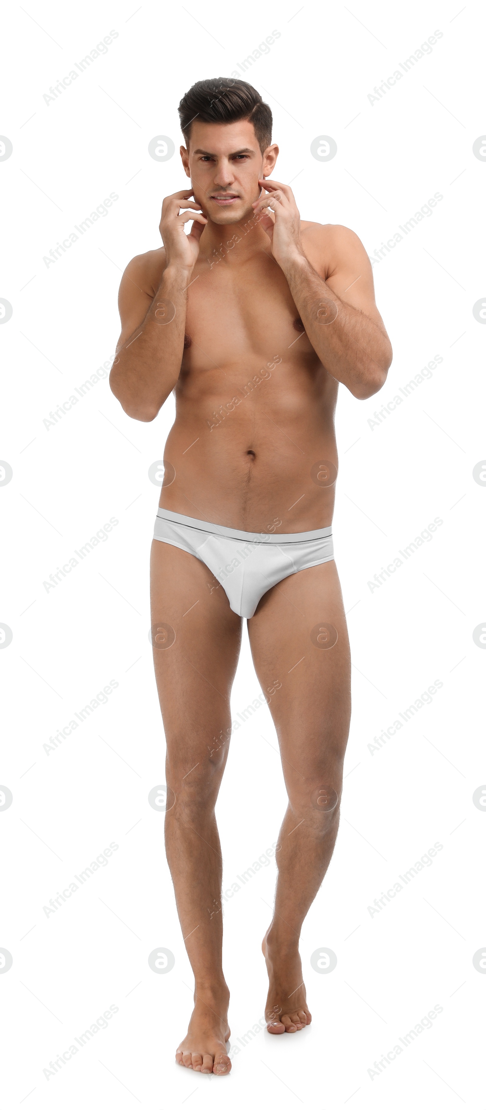 Photo of Handsome man in underwear on white background