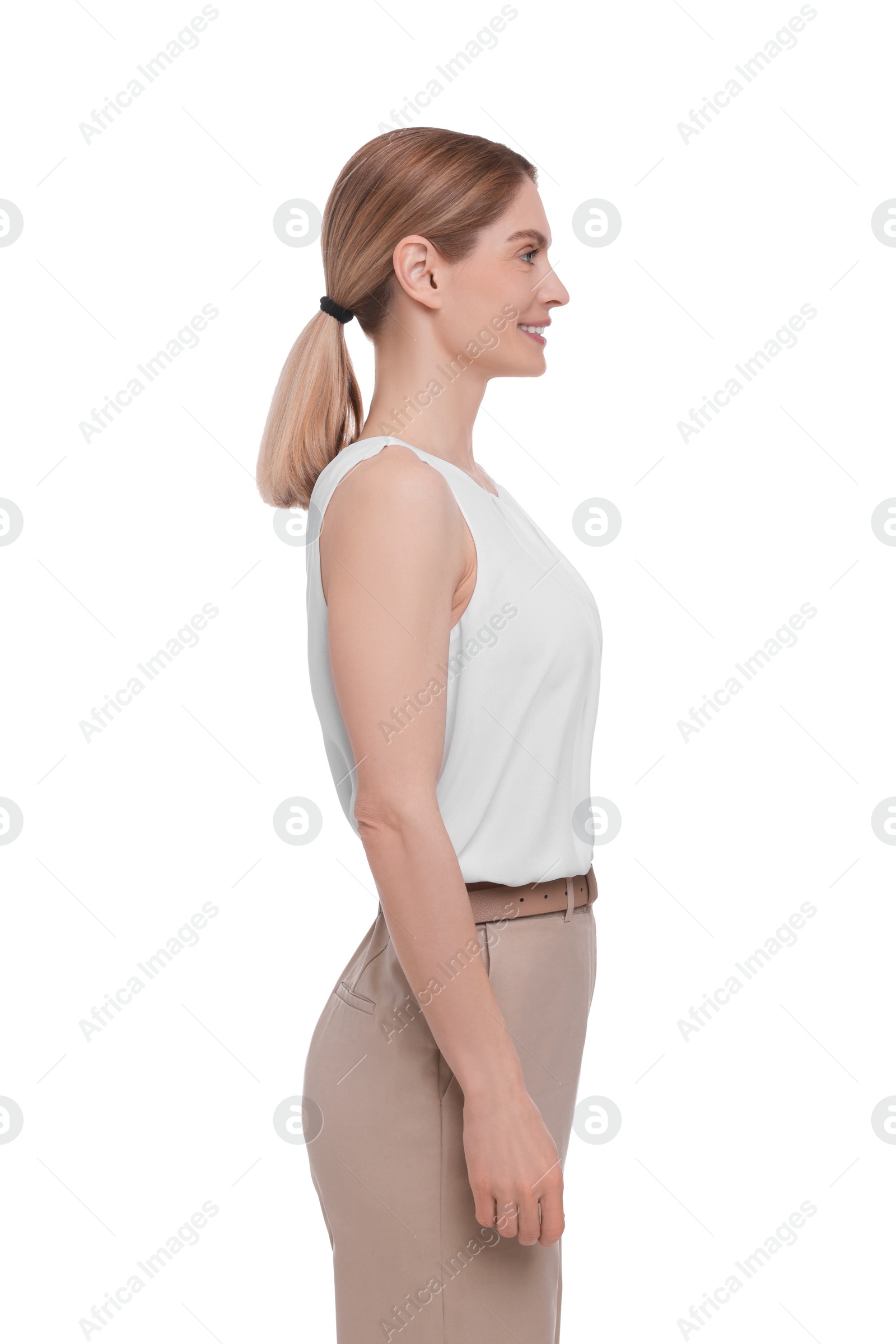 Photo of Beautiful happy businesswoman posing on white background