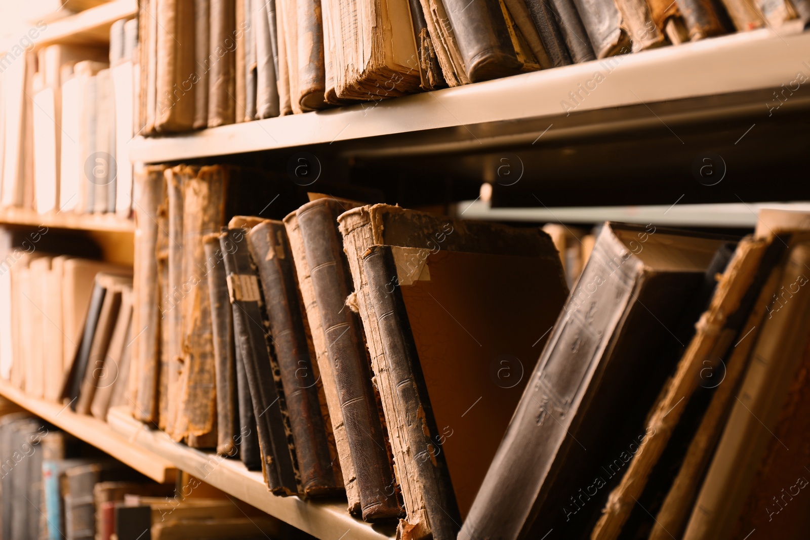 Image of Collection of old books on shelves in library