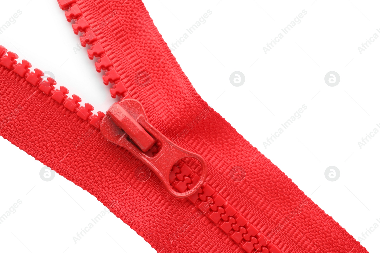 Photo of Red zipper on white background, top view