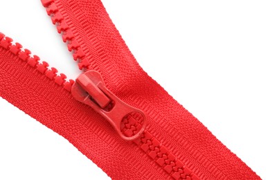 Photo of Red zipper on white background, top view