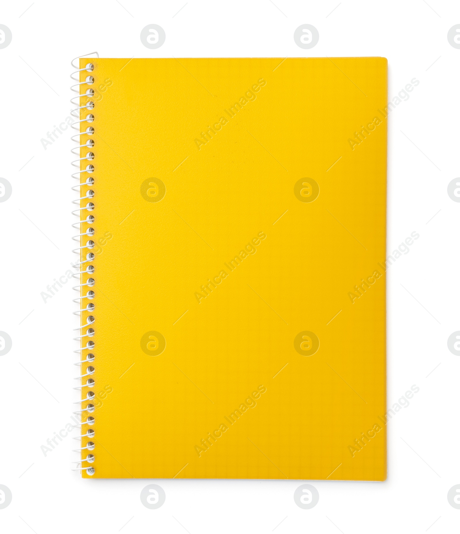 Photo of Stylish yellow notebook isolated on white, top view