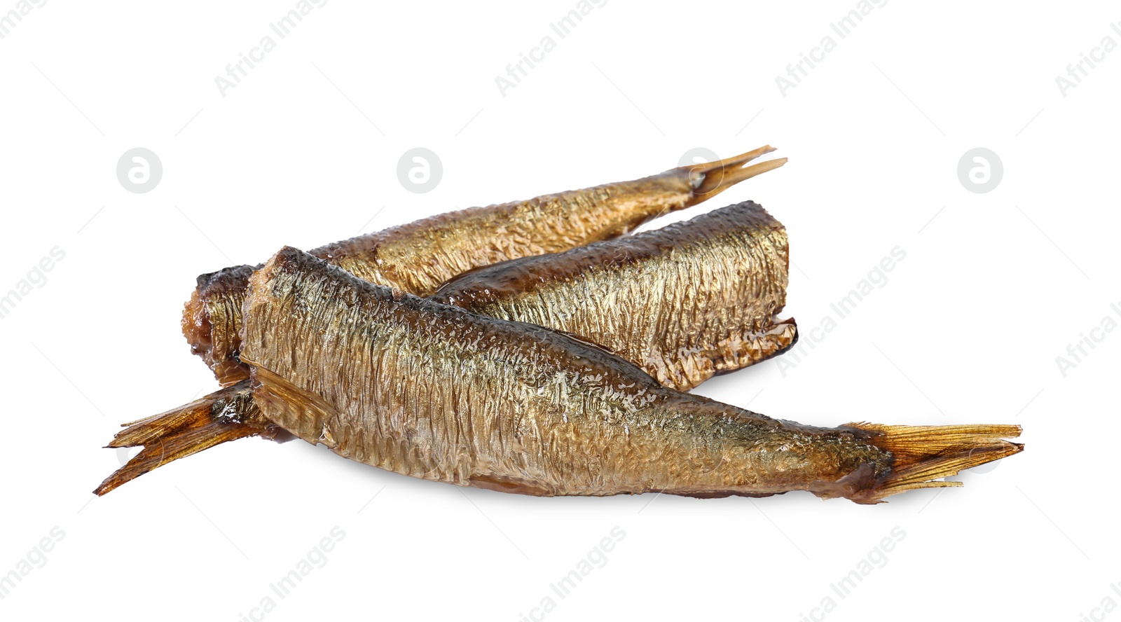 Photo of Many tasty smoked sprats isolated on white