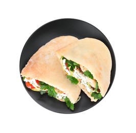 Photo of Plate of delicious pita sandwiches with grilled vegetables and sour cream sauce isolated on white, top view