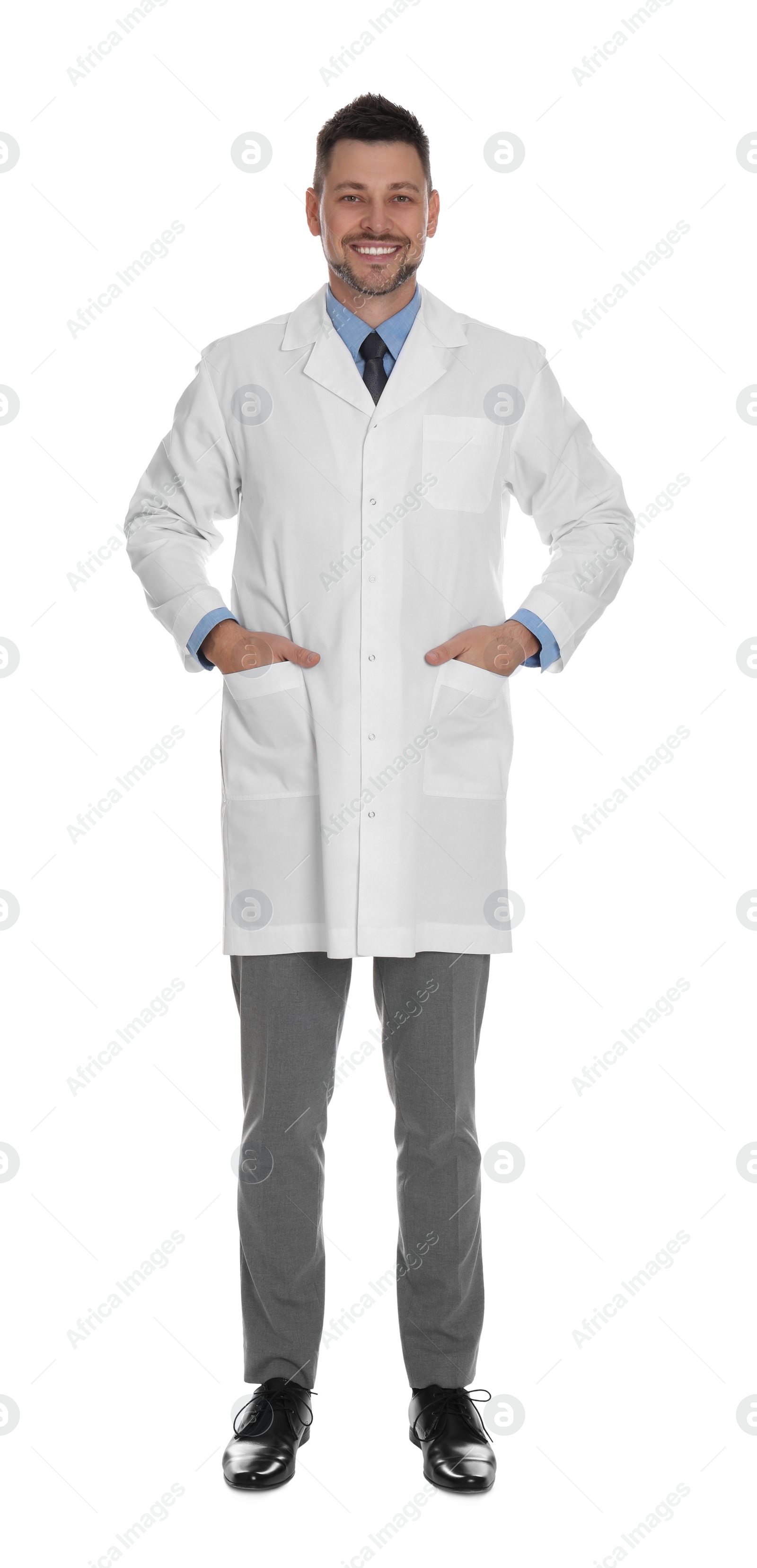 Photo of Happy man in lab coat on white background