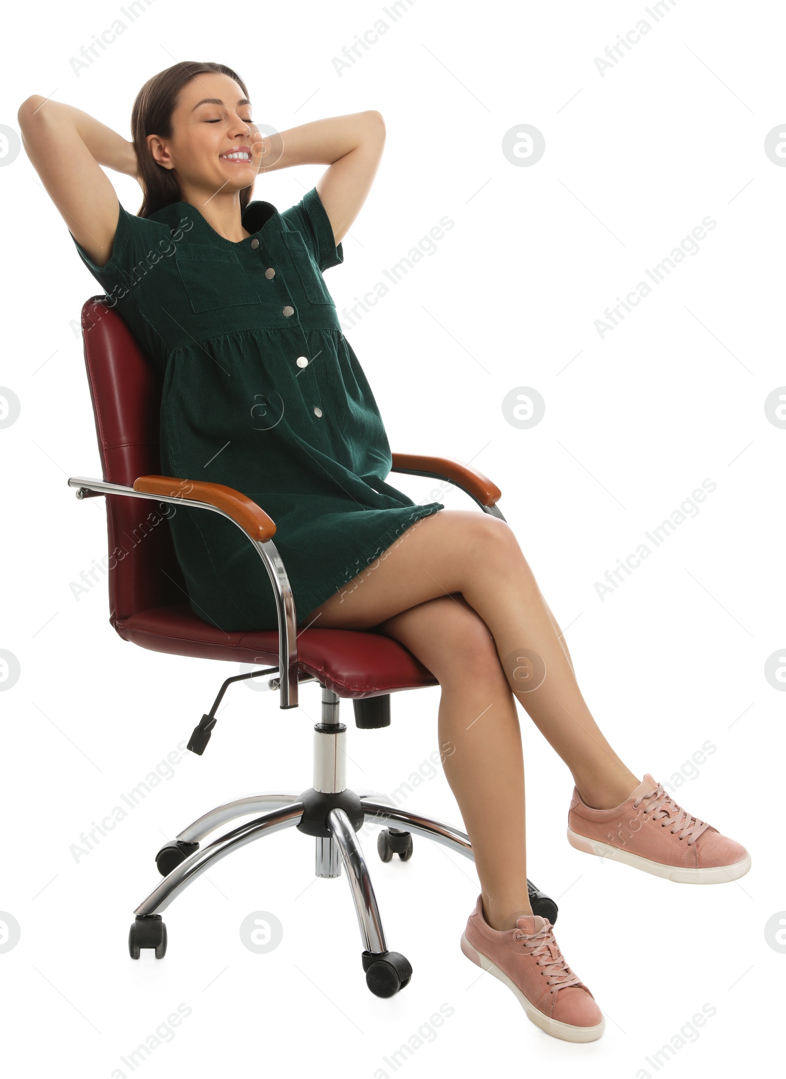 Photo of Young woman relaxing in comfortable office chair on white background