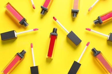 Photo of Composition of lipsticks on color background, flat lay.