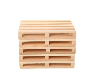 Photo of Stack of small wooden pallets on white background