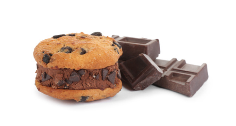 Photo of Sweet delicious ice cream cookie sandwich and chocolate isolated on white