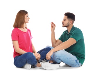 Photo of Hearing impaired friends using sign language for communication isolated on white