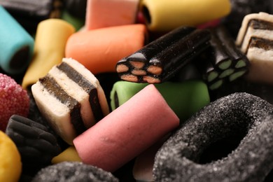 Photo of Many different liquorice candies as background, closeup