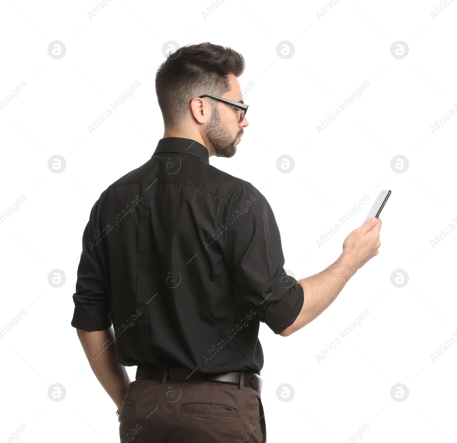 Photo of Young businessman with smartphone on white background