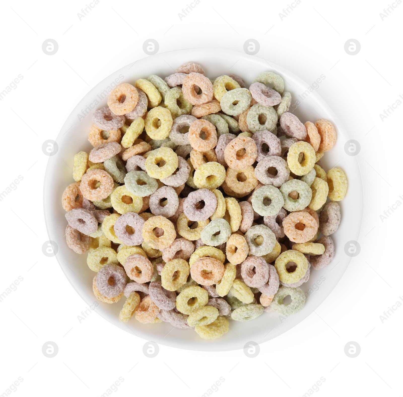 Photo of Tasty cereal rings in bowl isolated on white, top view