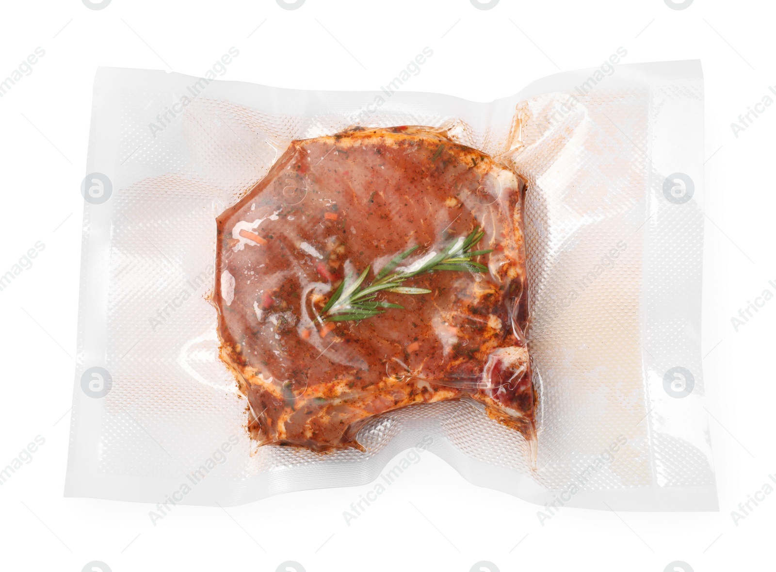 Photo of Vacuum pack of meat isolated on white, top view