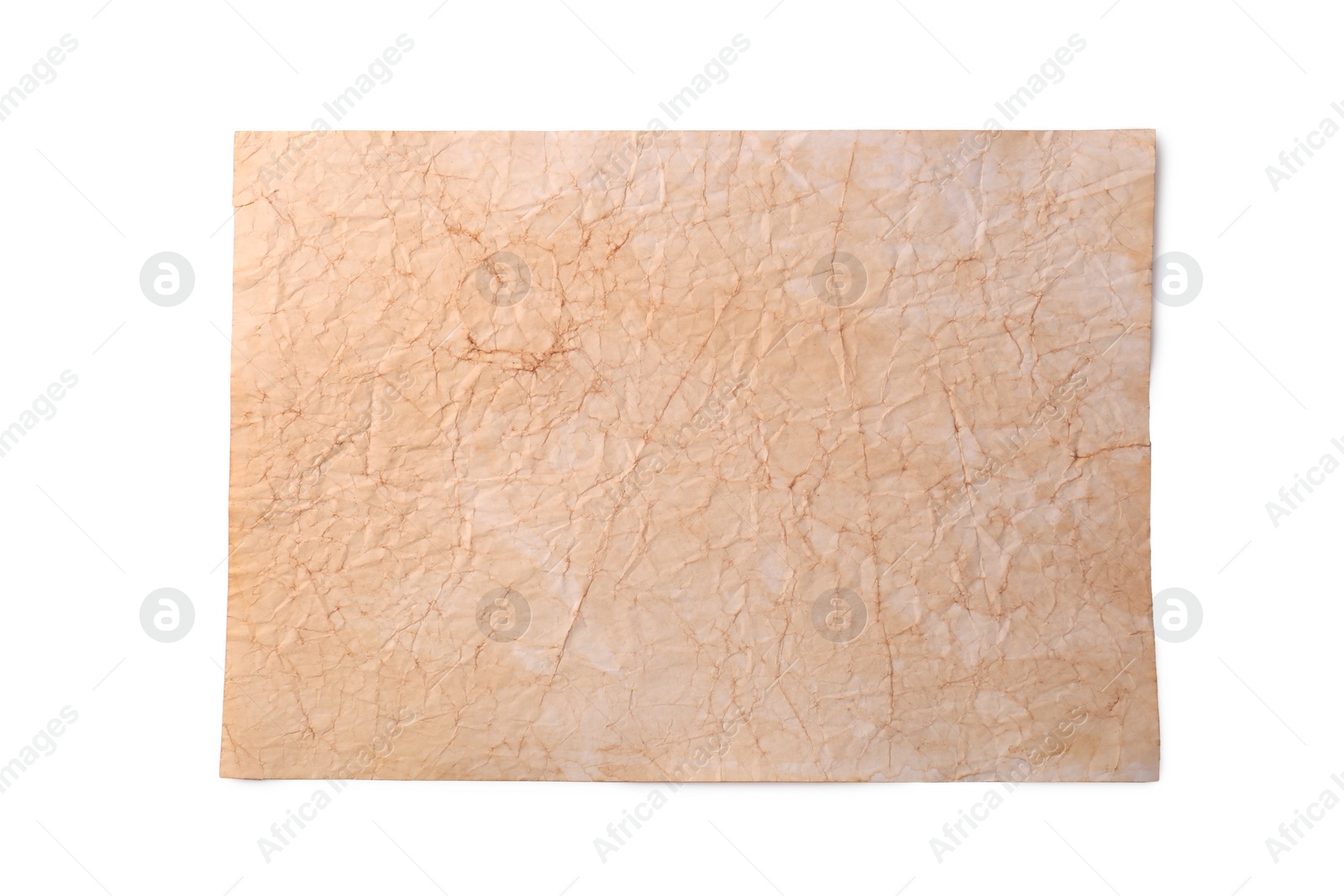 Photo of Sheet of old parchment paper on white background, top view