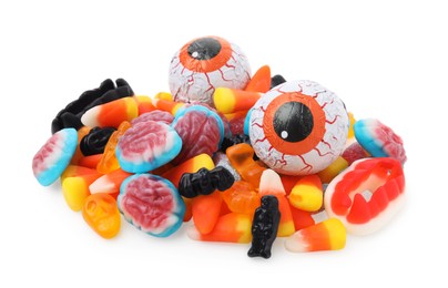 Photo of Delicious colorful candies on white background. Halloween sweets