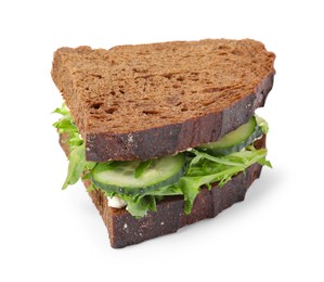 Tasty sandwich with cream cheese, cucumber and greens on white background