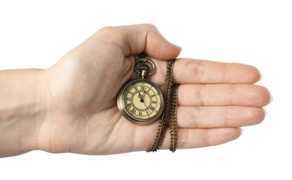 Photo of Woman holding pocket clock with chain on white background, closeup