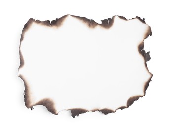 Photo of Piece of paper with dark burnt borders on white background, top view. Space for text