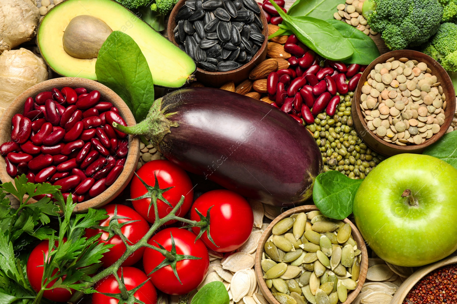 Photo of Different vegetables, seeds and fruits as background, closeup. Healthy diet