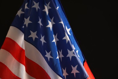 Photo of National flag of America on black background. Memorial day celebration