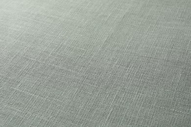 Photo of Texture of grey fabric as background, closeup