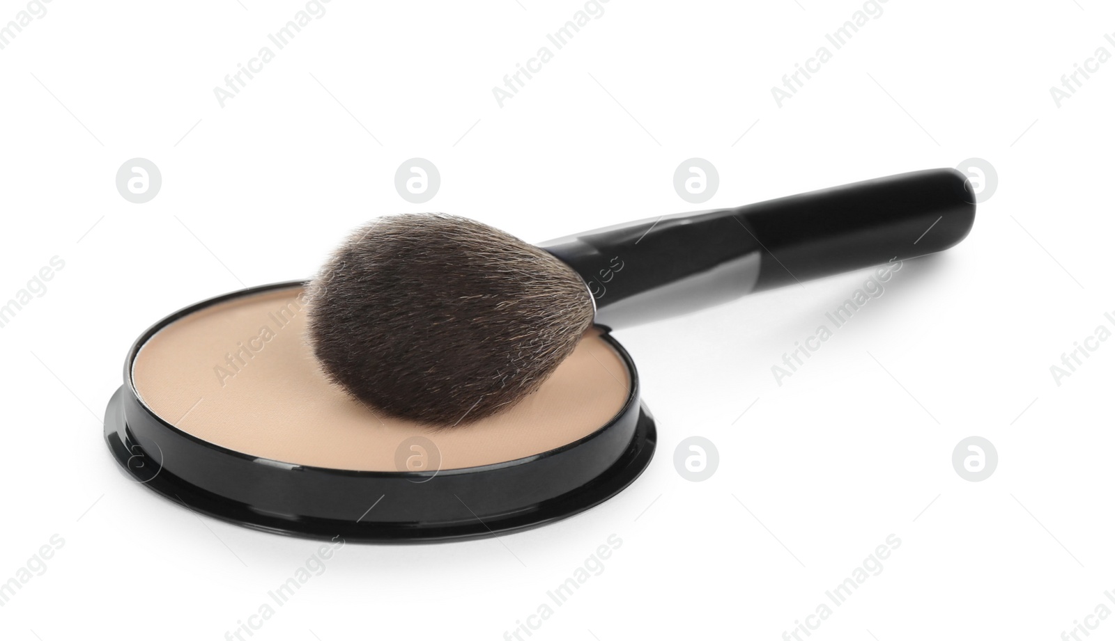 Photo of Face powder with brush on white background. Makeup product