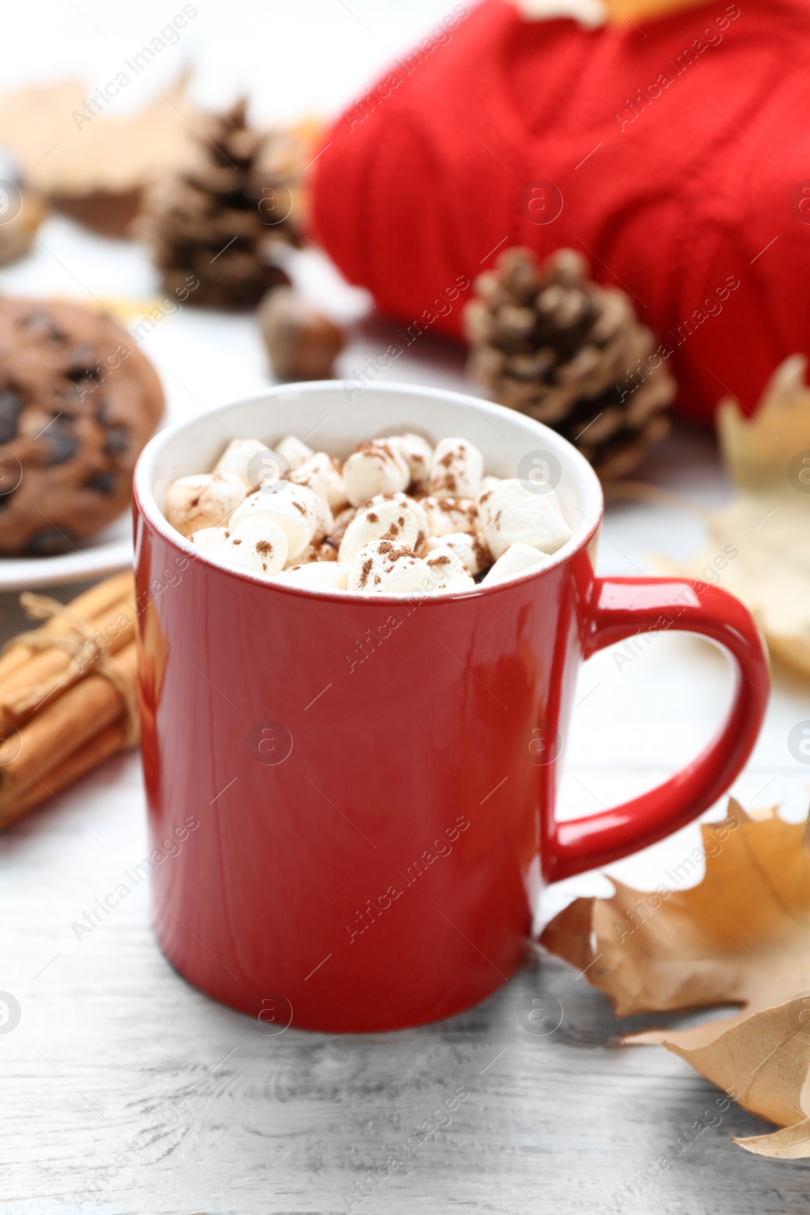 Photo of Cup of hot drink and cookies on white wooden table. Cozy autumn atmosphere