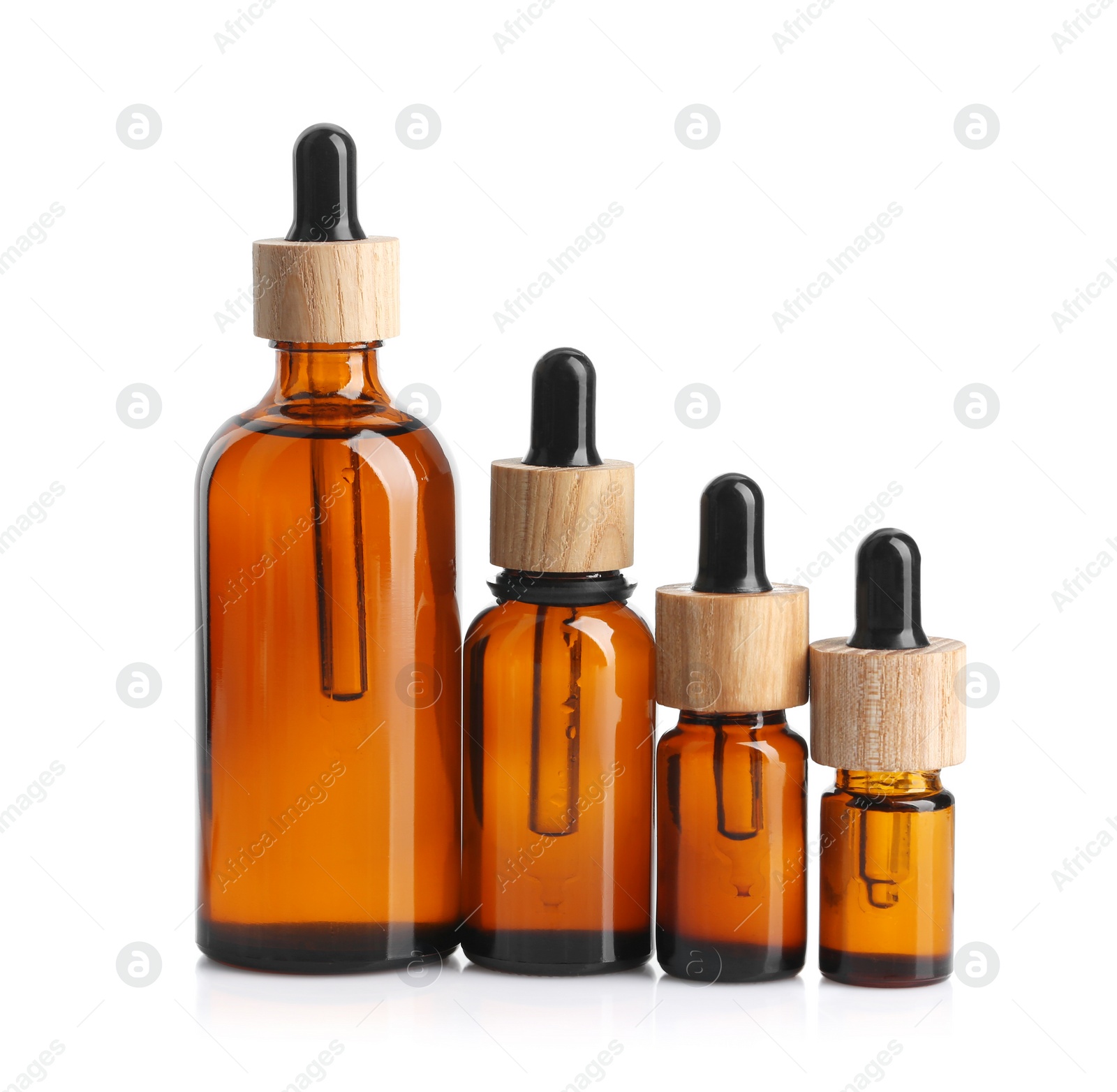 Photo of Glass bottles of tincture isolated on white