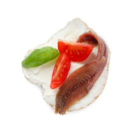 Delicious sandwich with cream cheese, anchovy, tomatoes and basil on white background, top view