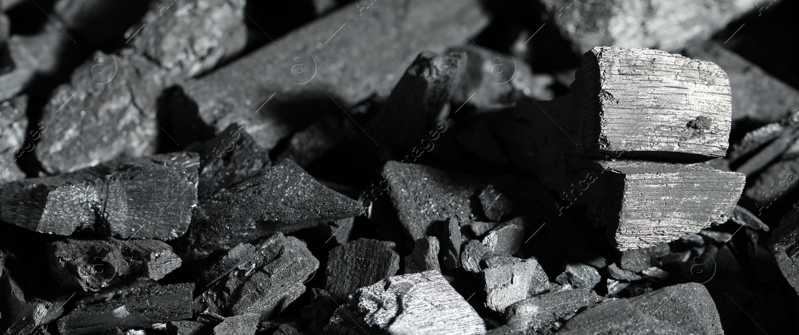 Photo of Heap of coal as background, closeup view