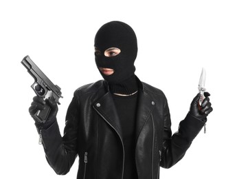 Photo of Woman wearing knitted balaclava with gun and knife on white background