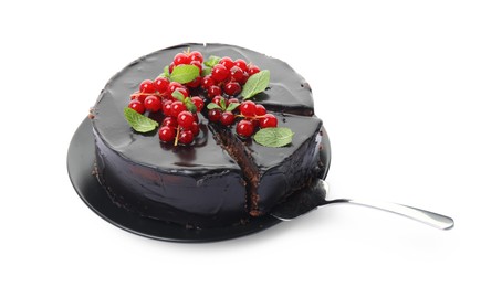 Tasty homemade chocolate cake with berries and mint on white background