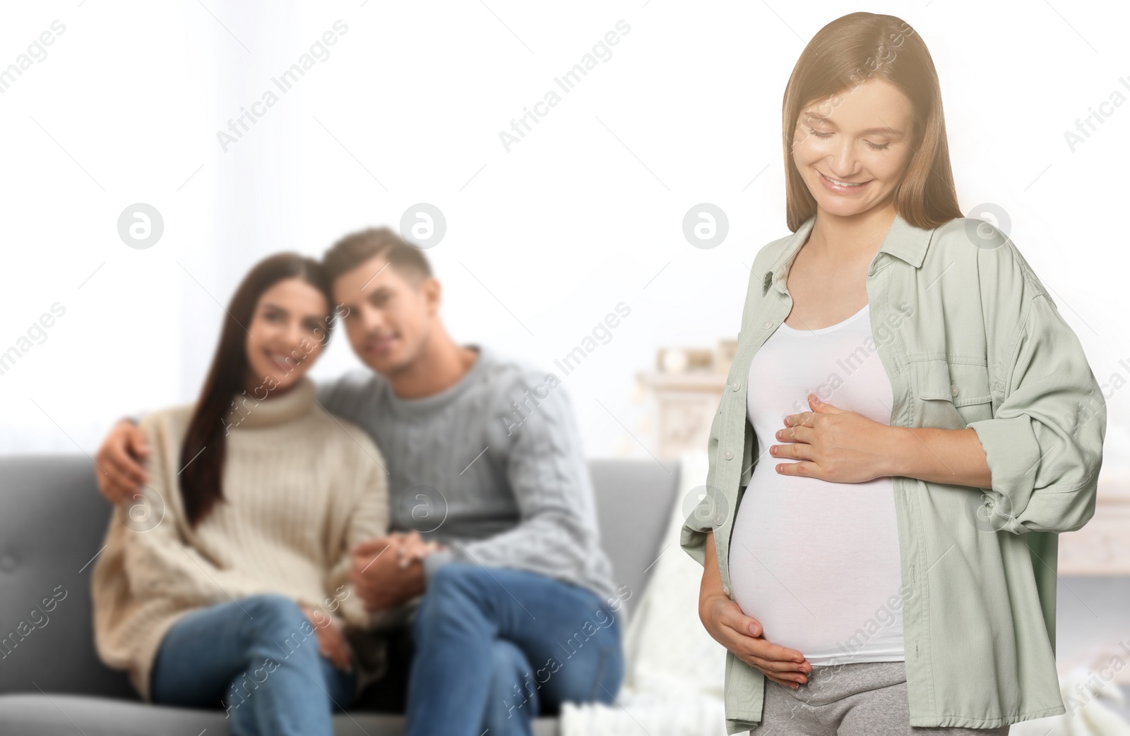 Image of Surrogate mother and intended parents in room