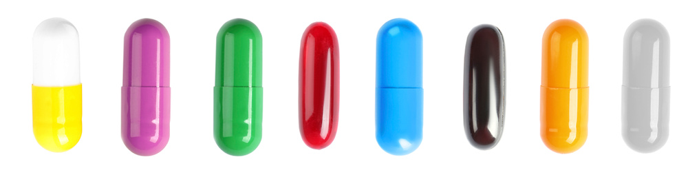 Image of Set with colorful pills on white background, top view. Banner design