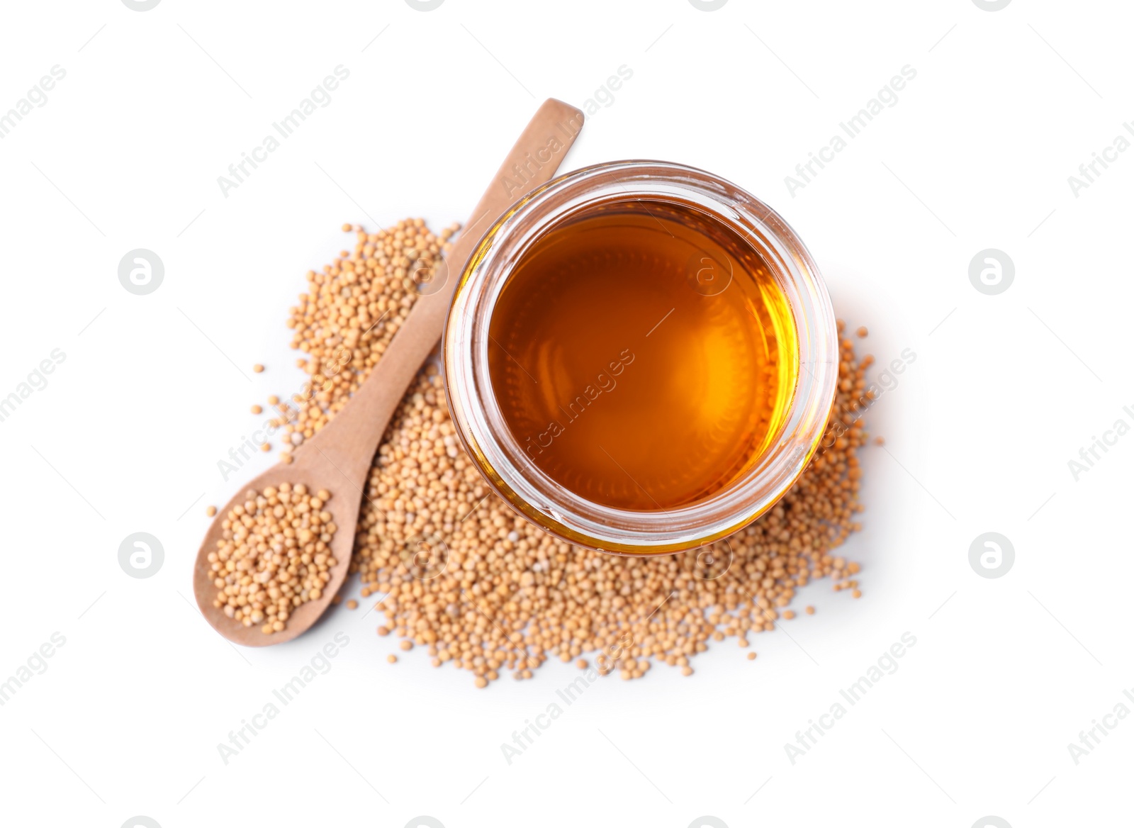 Photo of Natural oil and mustard seeds isolated on white, top view