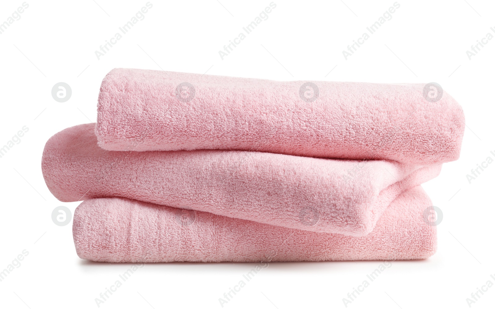 Photo of Stack of clean soft towels on white background