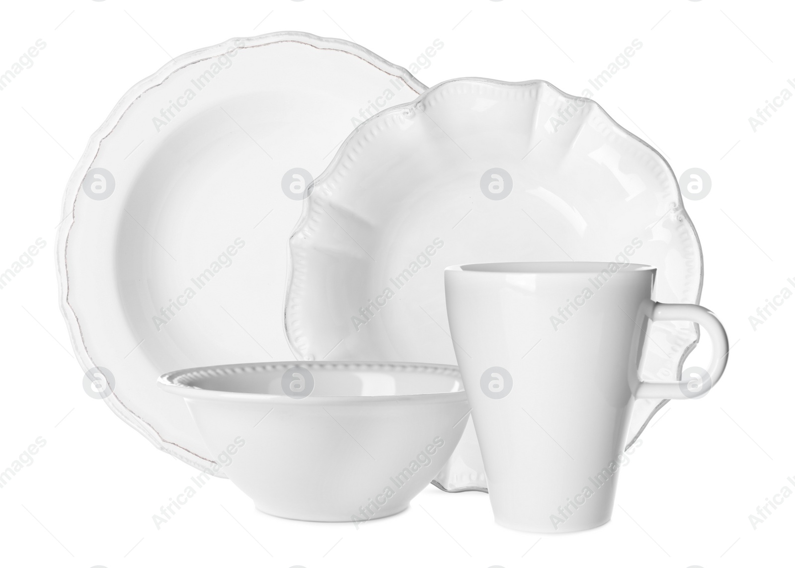 Image of Set of beautiful ceramic dinnerware on white background