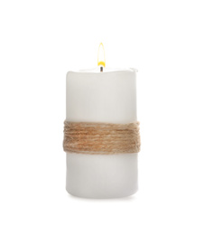 Wax candle decorated with twine isolated on white