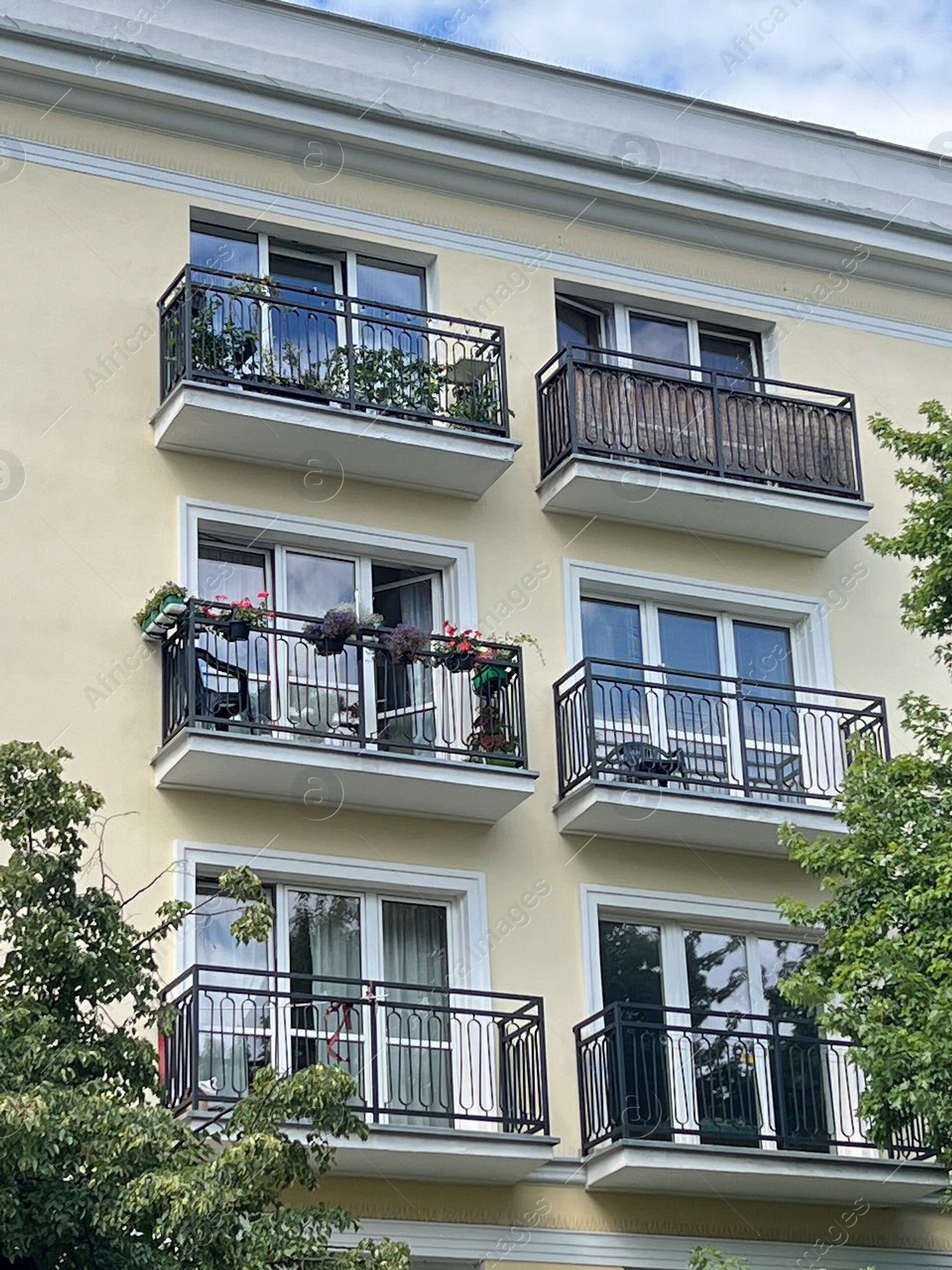 Photo of Exterior of beautiful residential building with balconies