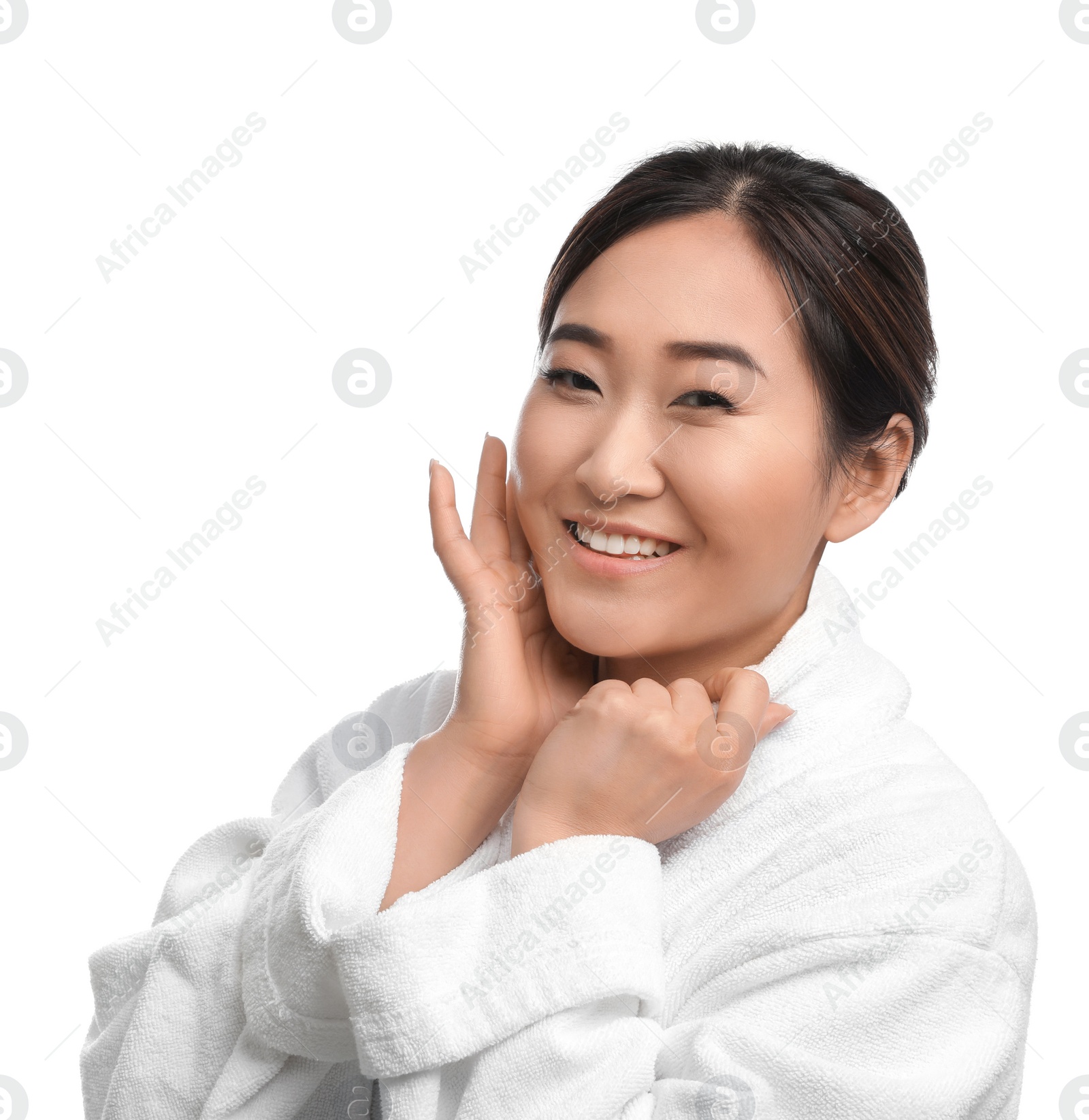 Photo of Portrait of beautiful Asian woman in bathrobe isolated on white. Spa treatment