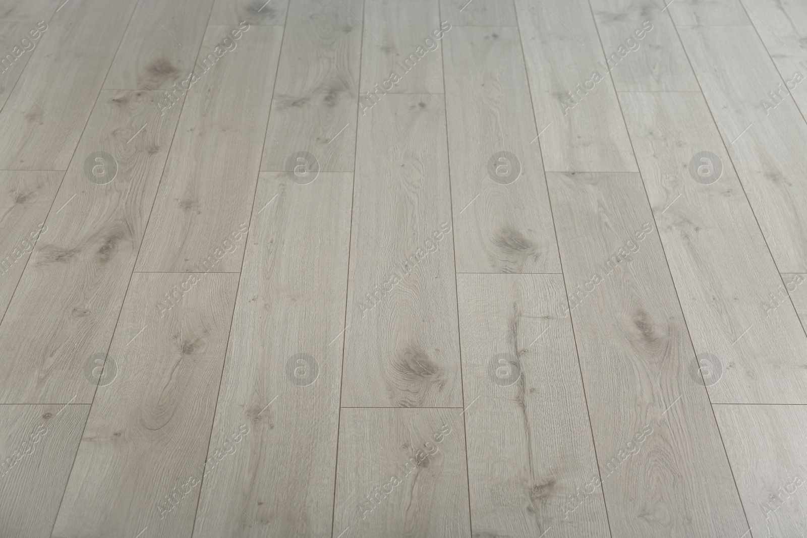 Photo of Light wooden laminate as background. Floor covering