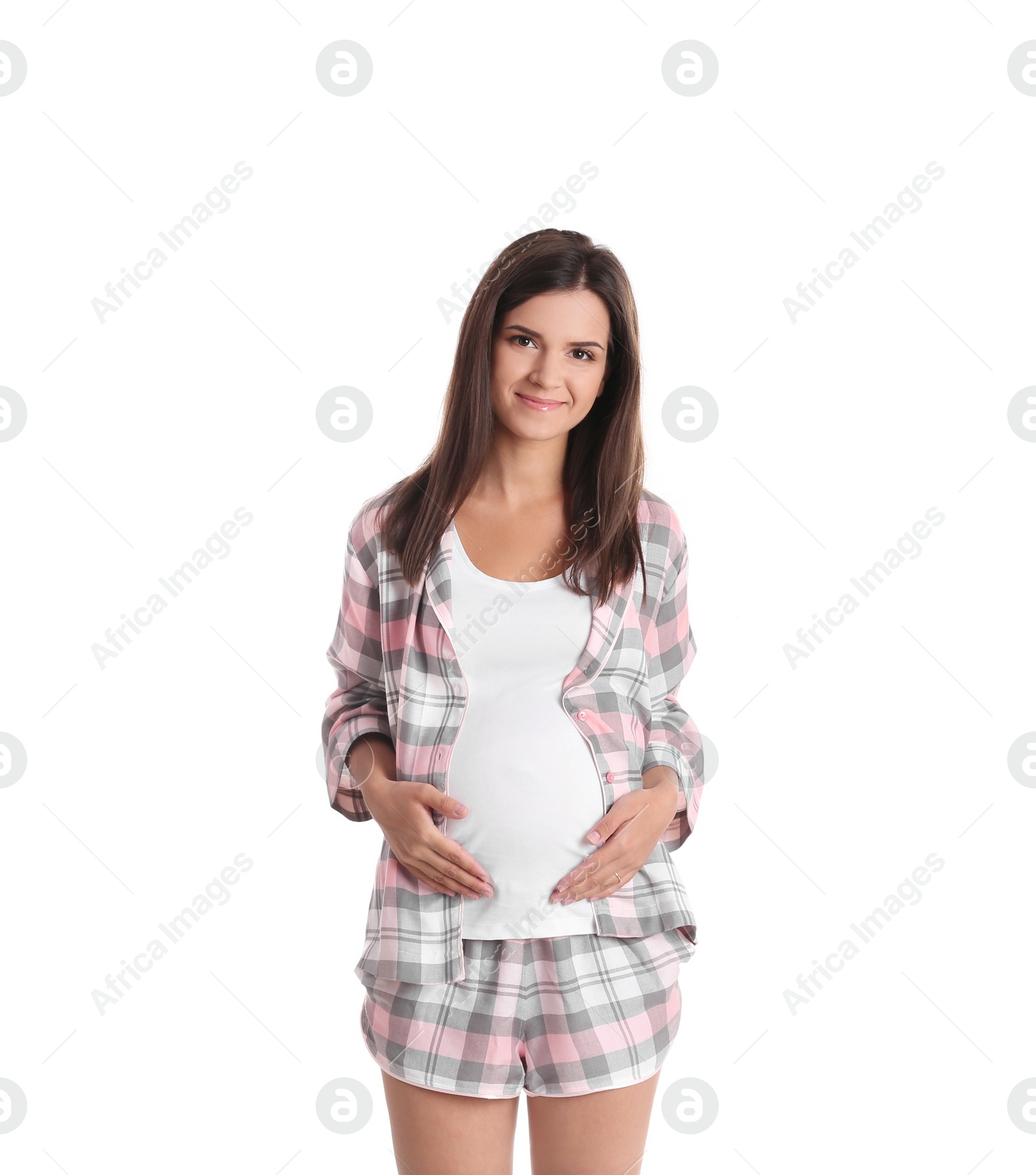 Photo of Happy pregnant woman posing on white background