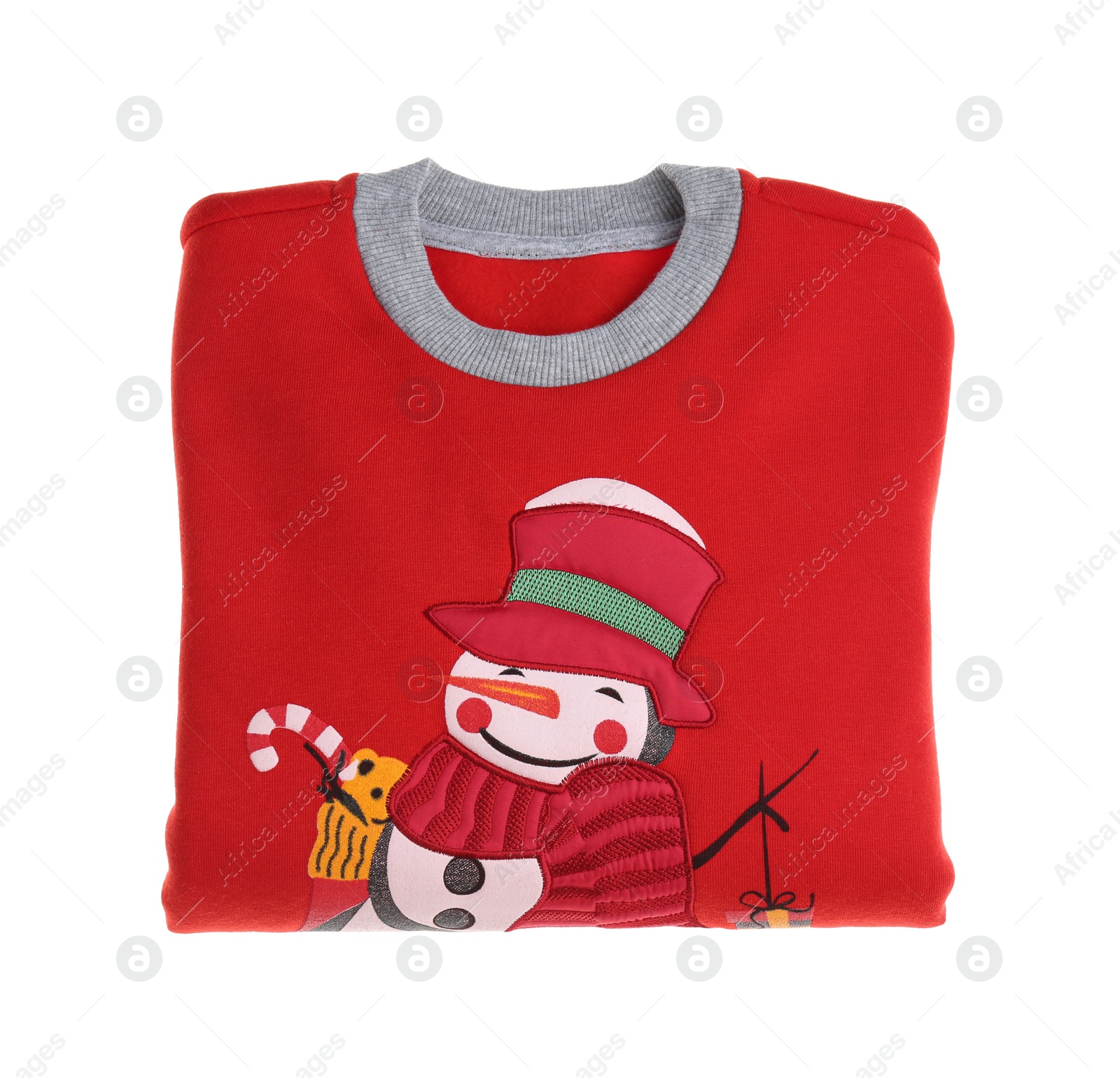 Photo of Folded warm Christmas sweater with snowman isolated on white, top view