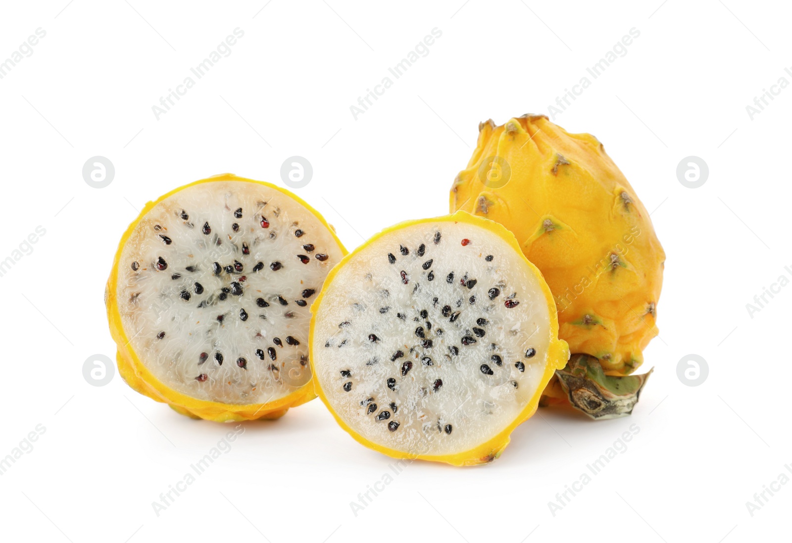 Photo of Delicious cut and whole yellow pitahaya fruits on white background