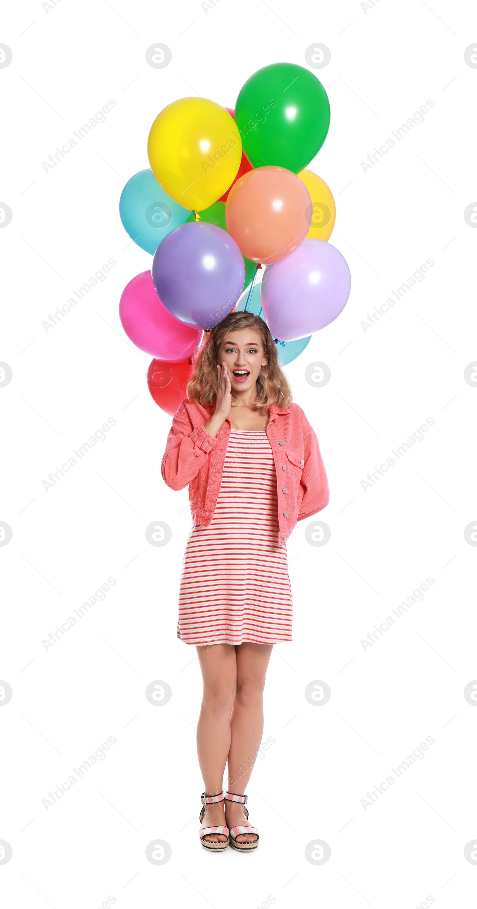 Photo of Emotional young woman holding bunch of colorful balloons on white background